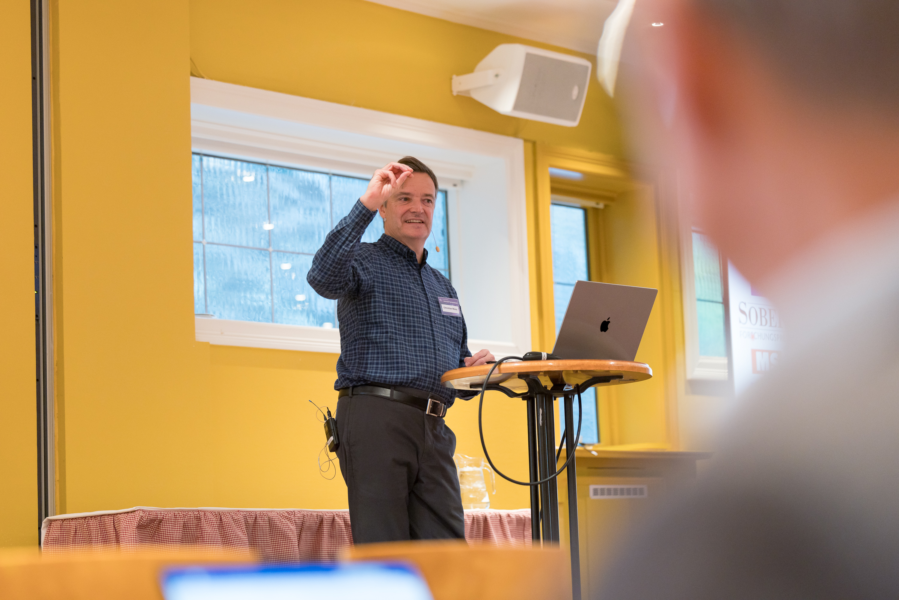 Professor Christian Munz at the Neuro-SysMed 2025 Annual Symposium. 